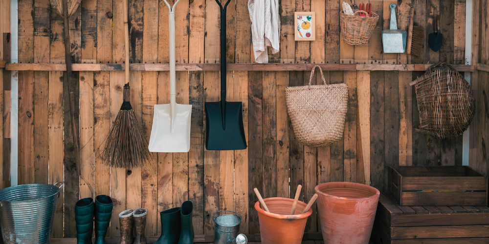 Essential tools for growing dragon fruit including secateurs, gloves, and plant labels
